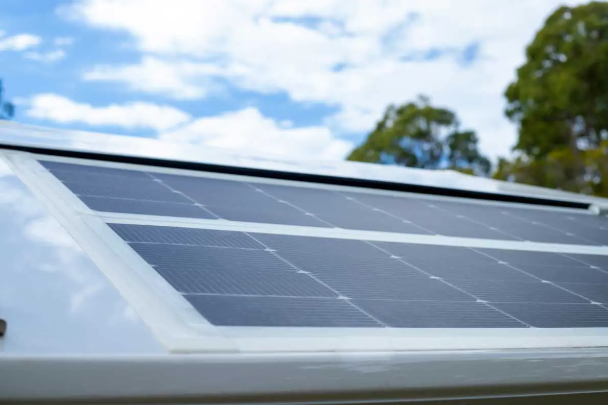 A close up of the solar panel on top of a roof.