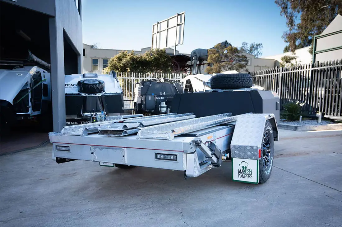 A trailer that has two tires on it.