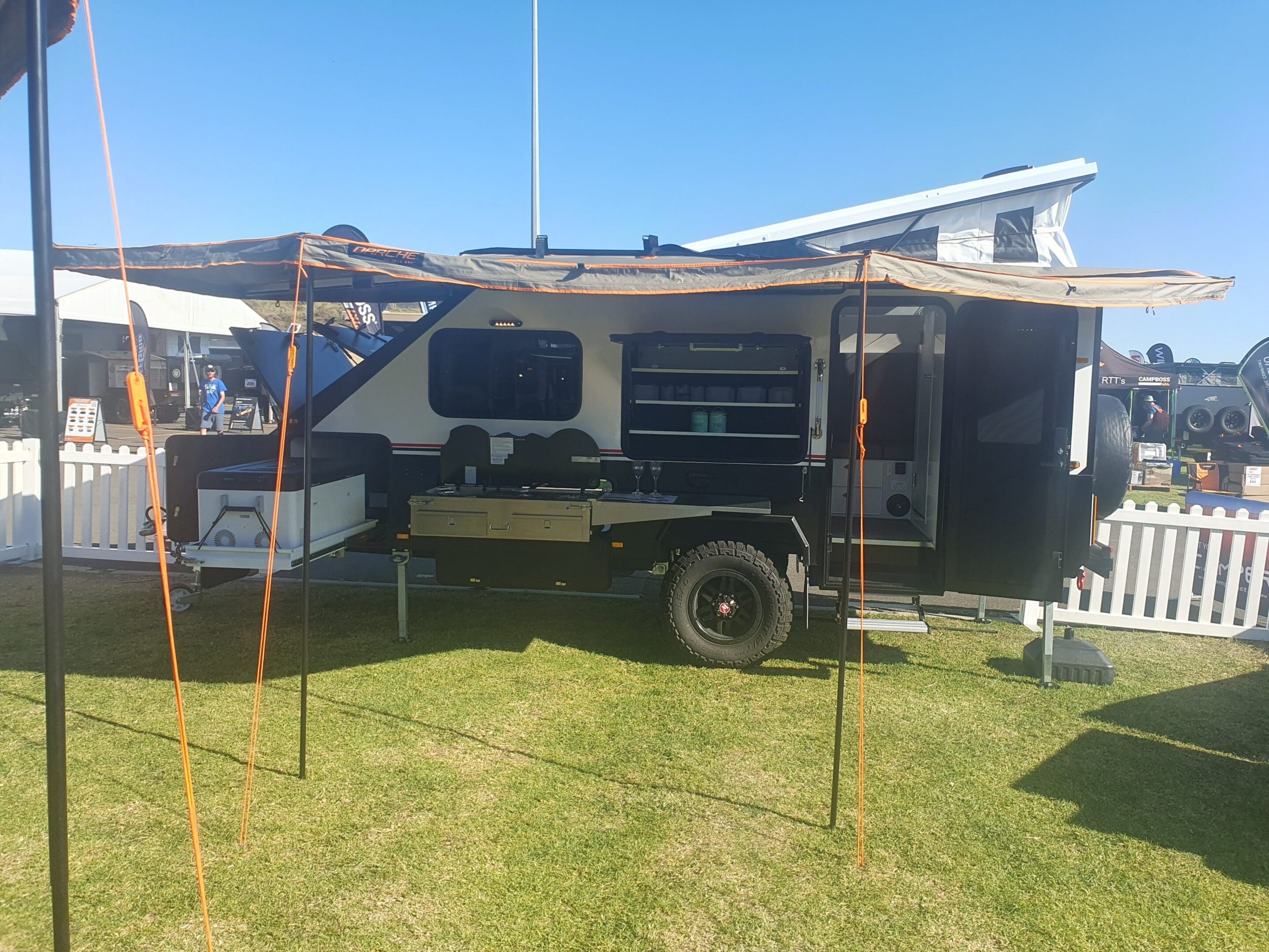 A trailer with an awning attached to it.